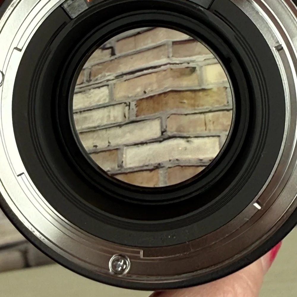It’s the Canon EF Nifty 50! 1.4 EF